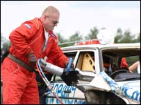 Simon Morrell cutting off a car door