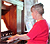 Noelyne, playing organ