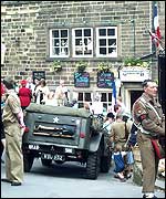 'Army' men and wartime military car