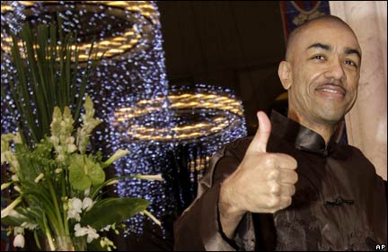 Mark Ndesandjo, the intensely private half-brother of President-elect Barack Obama, gives the thumbs up at a charity concert in Shenzhen, southern China, Friday, Jan. 16, 2009. The press release for the concert didn