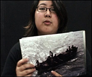 Jessica Emmett holding photograph