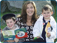 Dairine with Evan and Dillon from Ros na Rún dressed as the characters from her books - Páidí Péintéir and An Dochtúir Dan.