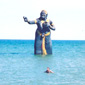 Nigel's wife Sheila bathing at Puek-Tian. The beach is famous for its statues in the sea depicting characters from one of Thailand's most respected poets, Sunthon Phu, and his epic 30,000 line story Phra Aphai Mani