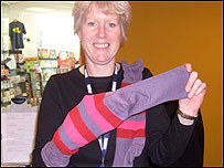 Monica Winfield with a pair of socks