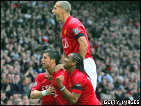 Manchester United players celebrate a goal