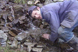 Alun drinks at the source