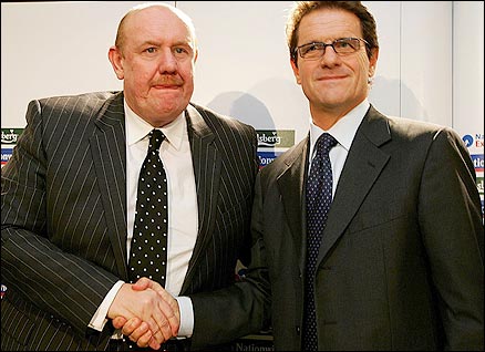 Barwick poses for the photographers with new England coach Capello