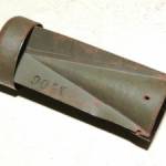 The casing of an incendiary device, which I now use as a vase for daffodils! It came down on my bedroom windowsill - I've kept it as a souvenir!