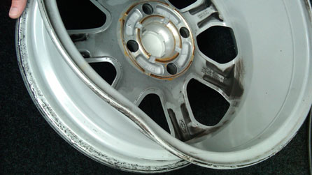 Damaged wheel caused by a pothole