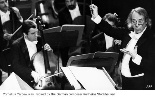 Karlheinz Stockhausen conducting an orchestra