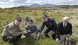 4 of the GI tank battalion rediscovering old tank-tracks - possibly their own - in Co. Down