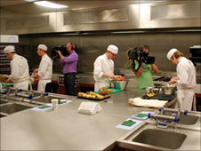 Camera crews follow John and David as they prepare their dishes in the kitchens at Newcastle College