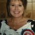 Listener Wendy Parratt proudly wearing her 'Going Out With Alan Carr' rosette after playing Alan's Telly Quiz on the show