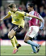 Steven Gerrard and Nolberto Solano