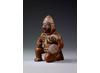 Pot in the form of a kneeling warrior from the Moche civilisation in Peru. Copyright Trustees of the British Museum Pot in the form of a kneeling warrior from the Moche civilisation in Peru. Copyright Trustees of the British Museum
