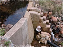 The weir at the top of the fellside