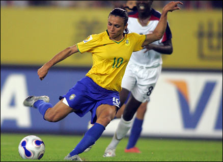 Marta of Brazil kicks to score her second goal against the US in their semi-final match