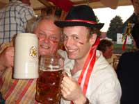 Jon with a beer mug that's nearly as tall as him