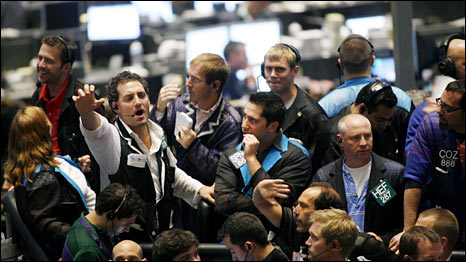 Traders work in the Euro Dollar pit at the Chicago Board of Trade