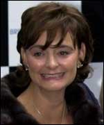 Cherie Blair grinning