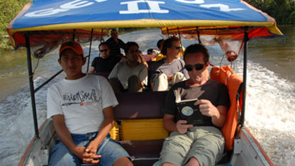 The team sail down the river Rio Ene