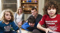 Mum (Claire Skinner) and Dad (Hugh Dennis) are Outnumbered by their children, Karen (Ramona Marquez), Jake (Tyger Drew-Honey) and Ben (Daniel Roche)