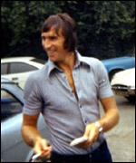 Captain Duncan Forbes signing autographs for fans