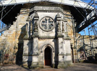 Rosslyn Chapel building surrounded by scaffolding