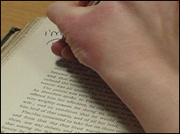 Writing in book