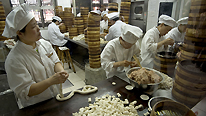 KITCHEN STAFF MAKING STEAMED CRAB DUMPLINGS IN FAMOUS 'NAN XIANG' DUMPLING SHOP. OLD CTY. SHANGHAI. CHINA © BBC/Kevin Foy 
