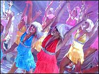 The dancers are part of a 100-strong cast.