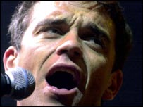 Robbie Williams singing