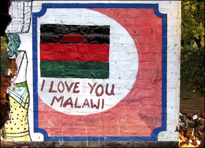 Malawi: A demolished building is used as a canvas for a colourful patriotic message. From Gray Munthali, Blantyre