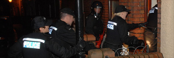 Police entering a property