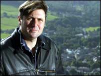 Simon Armitage with Marsden in the background