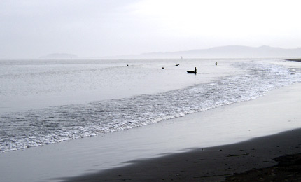 Stoked Oregon crew. "a good group in the water to share the knee to akle high glassy waves. Finger, Andrew, Paul, Chris and a few others."