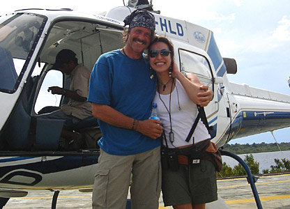 Keith and Raquel by the helicopter