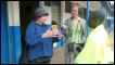 Road Kill presenter Sheena McDonald and producer Kirsten Lass interview a lollipop man in Nairobi, Kenya