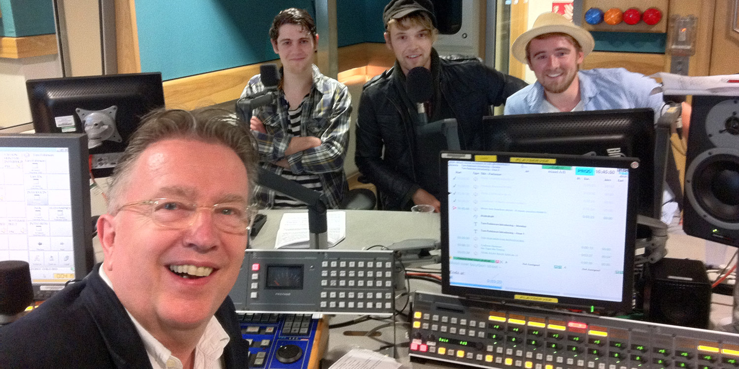 Tom in the studio with Athletes In Paris - whose new single we played yesterday