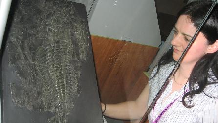 Dr. Lucy McCobb with fossil trilobite Paradoxides davidis