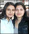 Photo of two women; link to story
