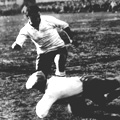 Argentina's goalkeeper Juan Botasso dives bravely at the feet of Uruguay's Hector Castro (image from empics)