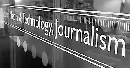 glass wall with new media on it