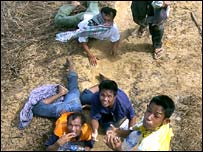 सूनामी की तबाही के शिकार लोग