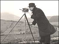 Sam Hanna using a camera