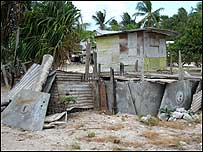 Truck bonnets used as fencing.