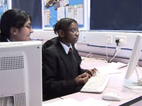 students working on their news reports