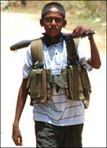 Young armed soldier in Theevuchchenai (photo Buddhika Weerasinghe)