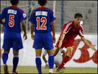 افغان لوبغاړى په سره جامه کې