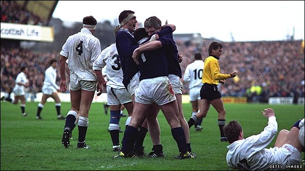 Chris Gray, David Sole and Finlay Calder celebrate 1990's Grand Slam-clinching win against England